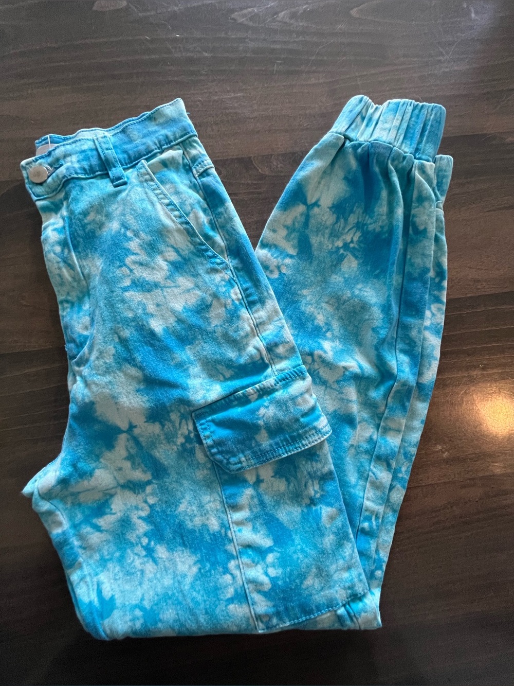 Almost Famous Tye-Dye Cargo Pants. 
Size:Small (Juniors)